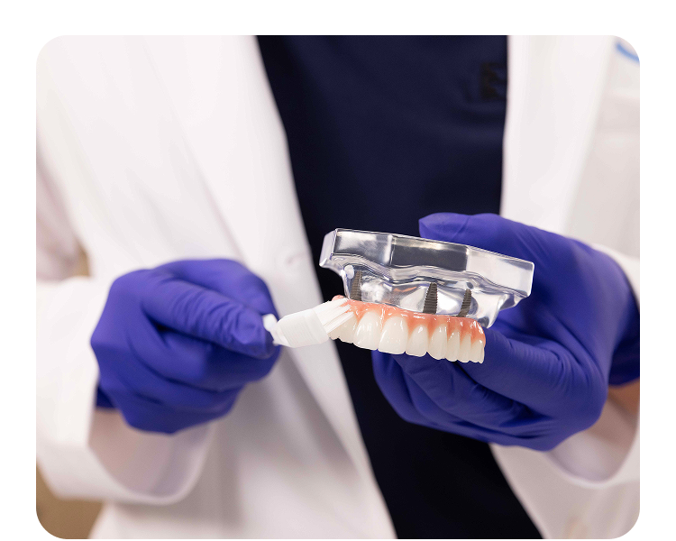 Aspen Dental provider presents proper cleaning tools and methods for maintaining dental implants and prosthetic restorations.