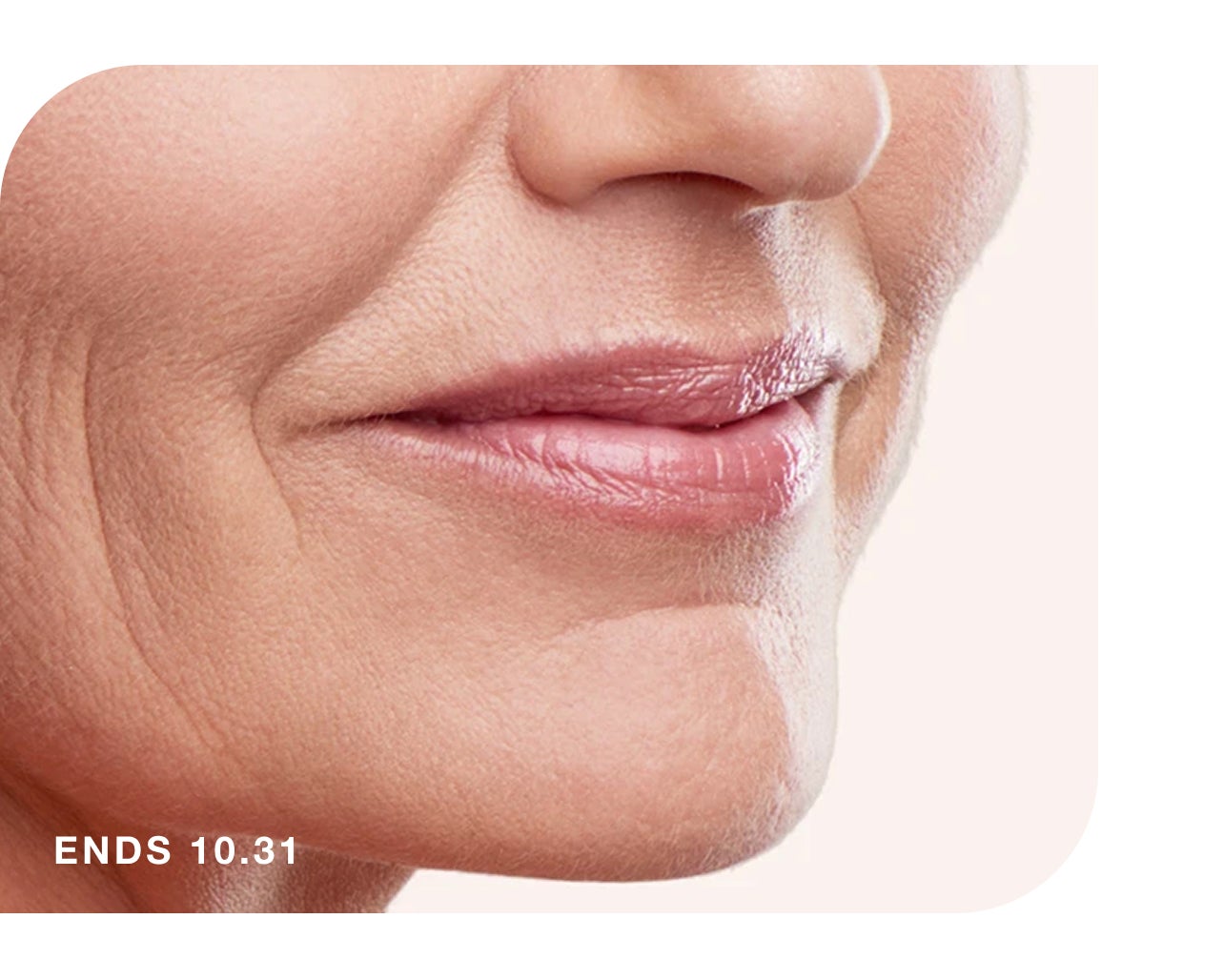 Close-up profile of a woman's mouth and cheek with visible wrinkles