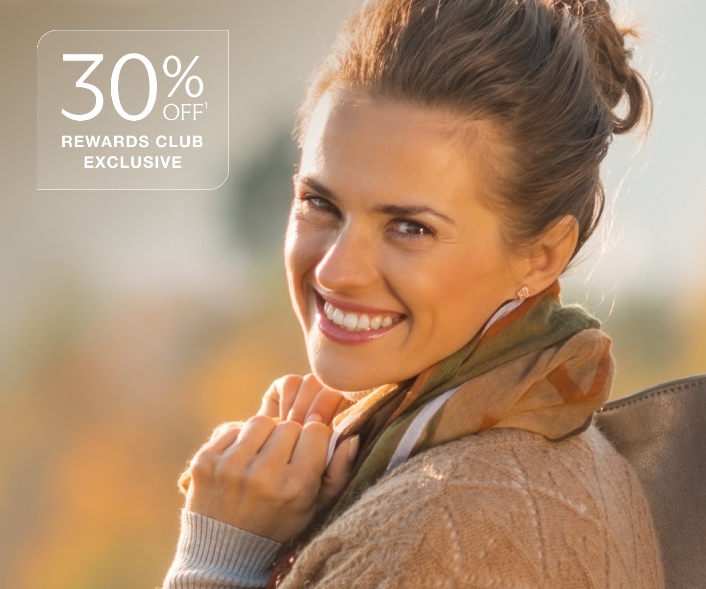Woman smiling outdoors with text overlay promoting Chapter Aesthetic Studio CoolPeel treatment, 30% off Rewards Club exclusive offer.