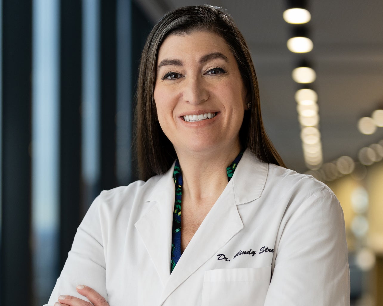 Portrait of Dr. Mindy Streem, orthodontic expert supporting clear aligner treatment and patient care at Motto