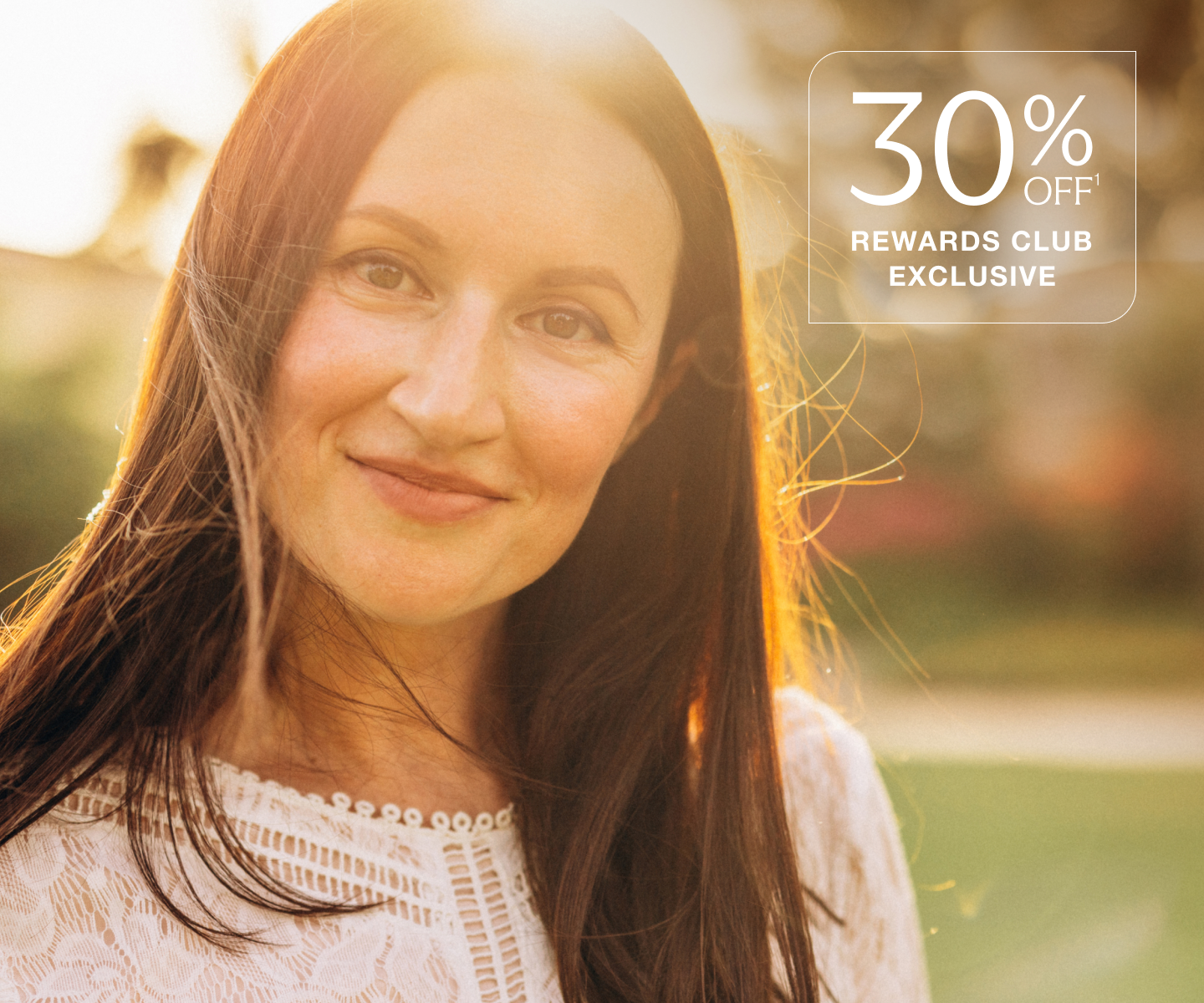 Woman smiling in sunlight promoting Chapter Aesthetic Studio VirtueRF microneedling with 30% off Rewards Club exclusive offer.