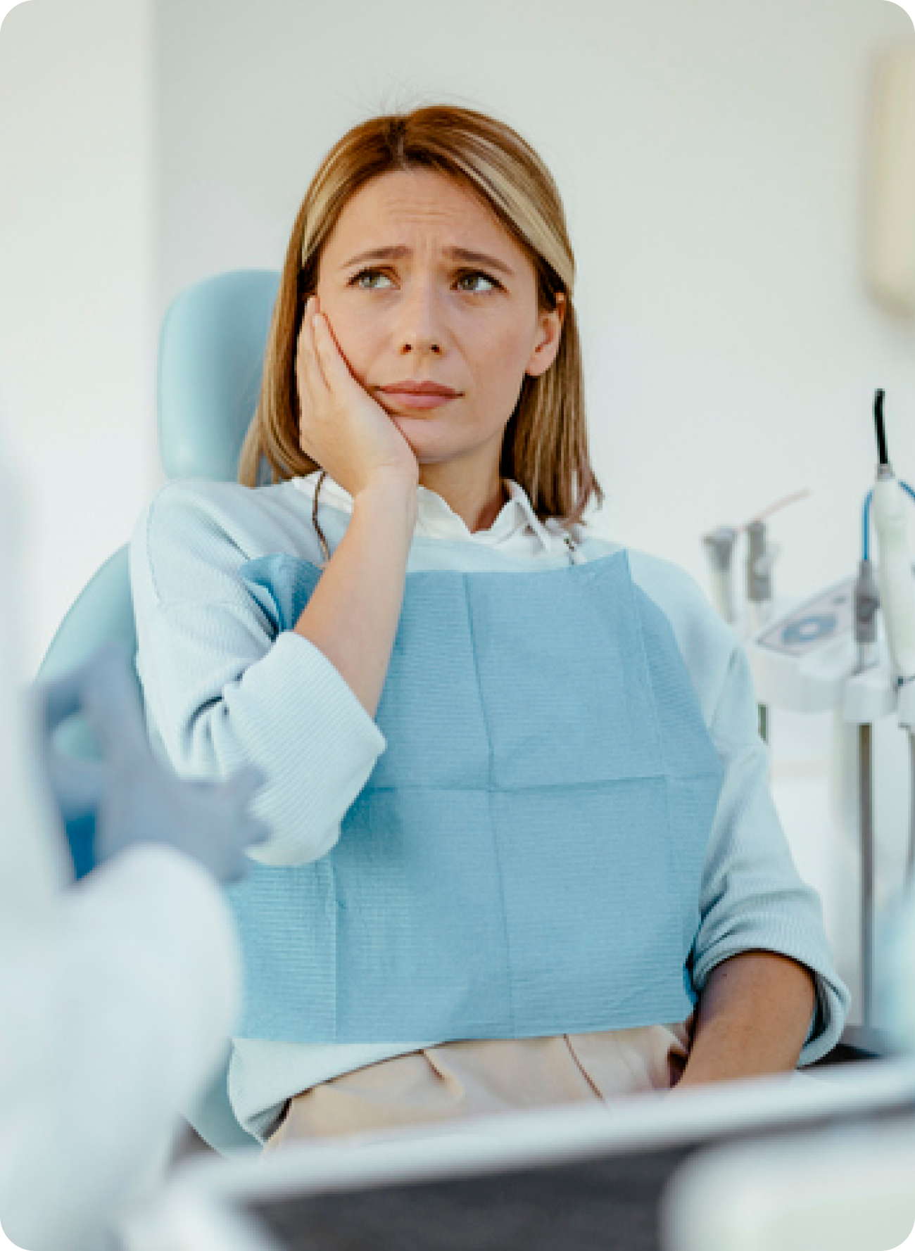 Why does my tooth feel soft or mushy when I bite down?