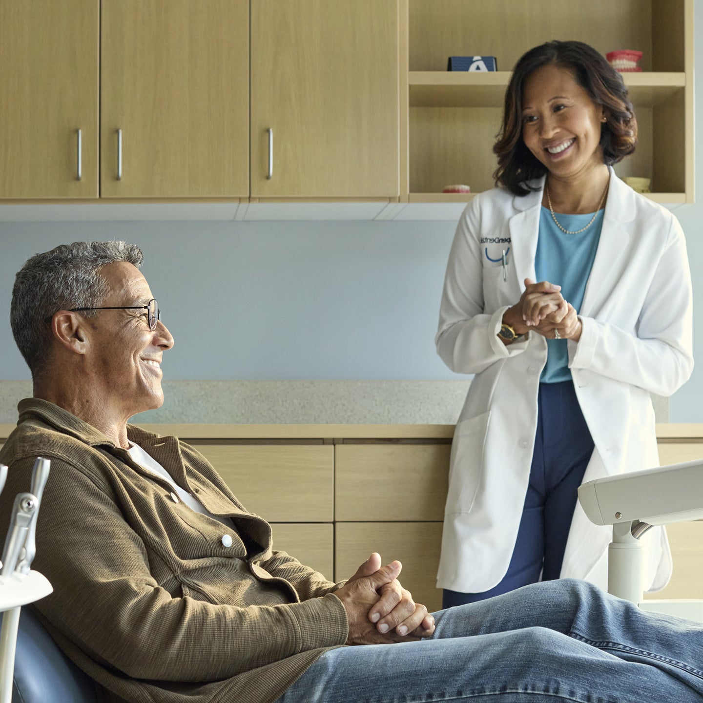 A healthcare professional and patient in a friendly conversation