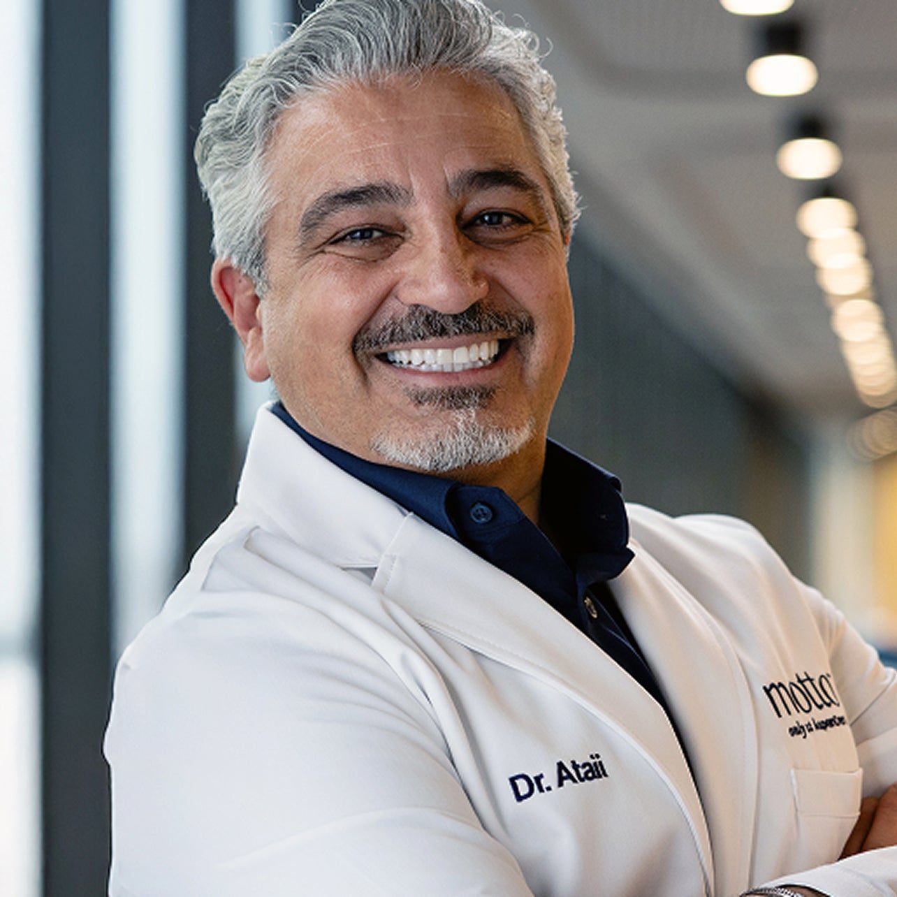 Portrait of Dr. Payam Ataii, clinical expert supporting clear aligner treatment and innovation at Motto
