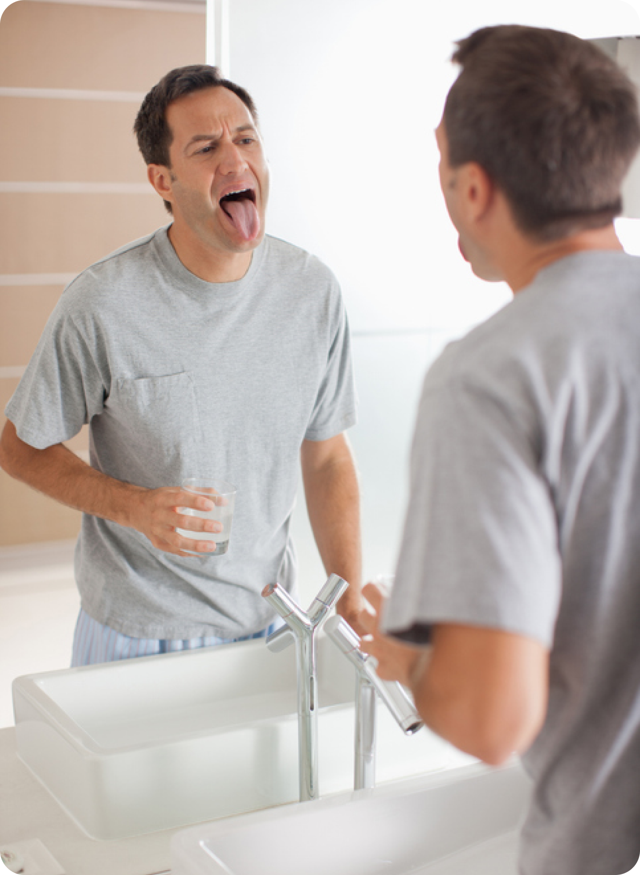 Why won't the white coating on my tongue go away?