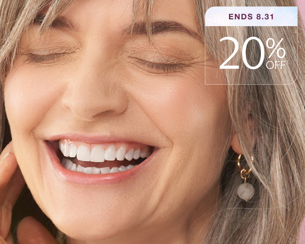A closeup of a smiling woman's face behind a graphic that says "20% off ends 8.31"