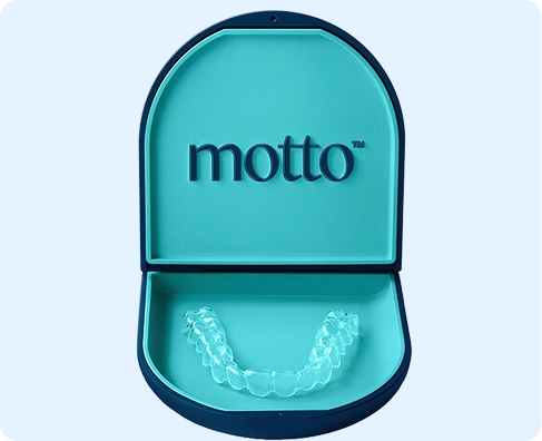 A teal-colored orthodontic aligner case with the word "motto" printed on the inside with a clear dental aligner inside the case.
