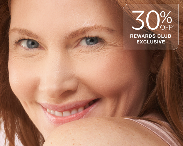 A close up of a smiling woman with text overlaid which reads "30% off rewards club exclusive"