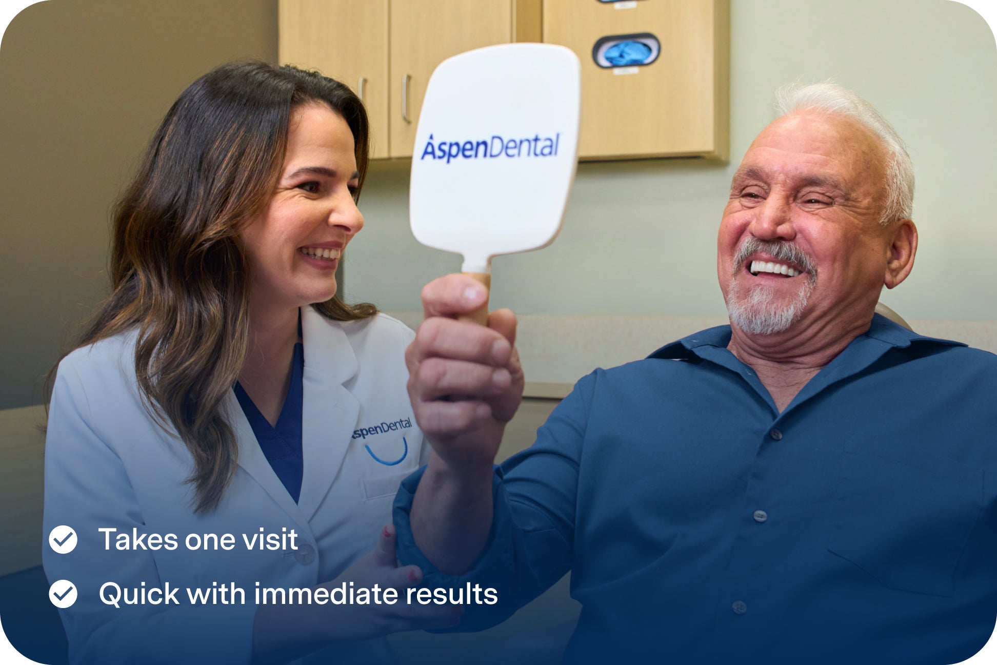 A smiling patient admires his reflection in an Aspen Dental mirror while a dentist in a white coat smiles beside him, with text noting that treatment takes one visit and delivers immediate results.