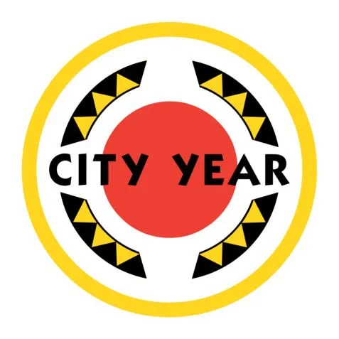City Year logo featuring a red circle at the center, surrounded by yellow and black geometric patterns and a bold yellow outer ring.