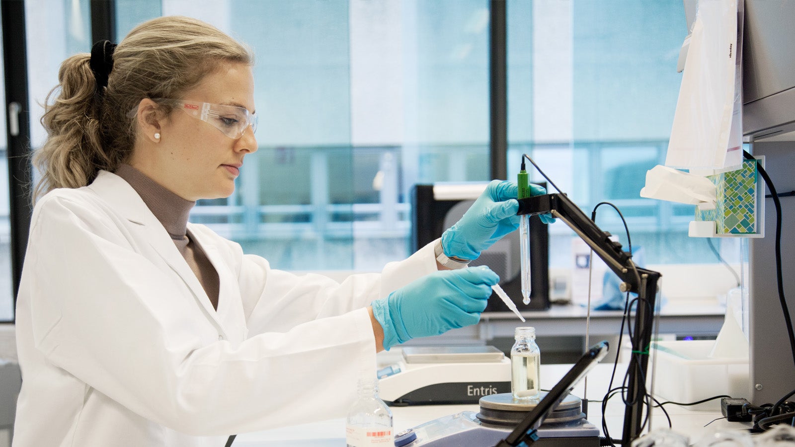 Chemist performing test in a laboratory for production and midstream