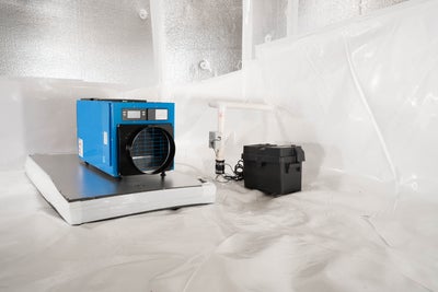encapsulated crawl space with dehumidifier, sump pump, and foam board insulation