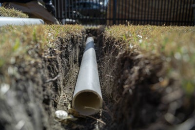 installing buried discharge lines