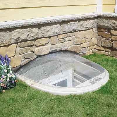 window well cover installed over an egress system's window well