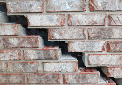 Large stairstep crack in brickwork.