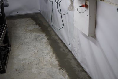 Close up of a foundation floor cracks repair in progress.