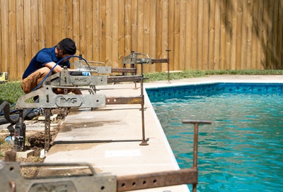 Pool deck being prepared for repair.
