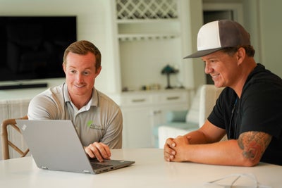 Alpha inspector meeting with a homeowner