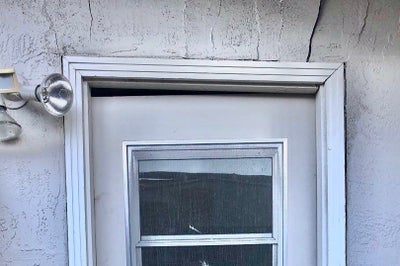 A misaligned door that represents major foundation damage