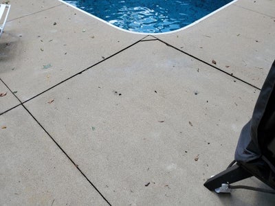 Cracked concrete pool deck