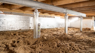 Series of crawl space jacks under your home.