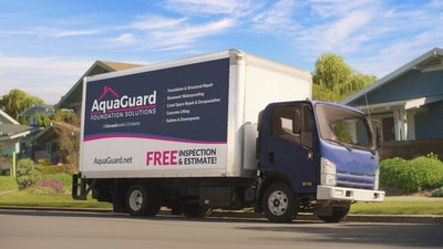 AquaGuard work truck in neighborhood