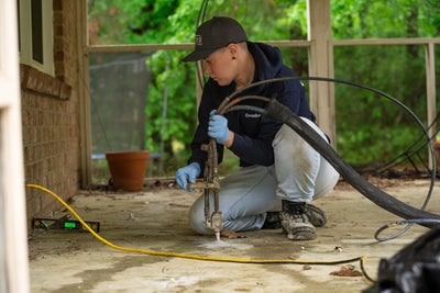 installing polyurethane injections for concrete patio repair
