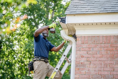 installing gutters and downspouts