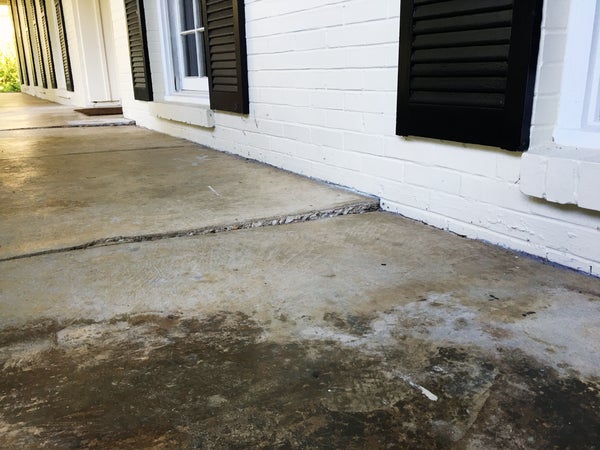 Front porch concrete steps are lifting and in need of repair