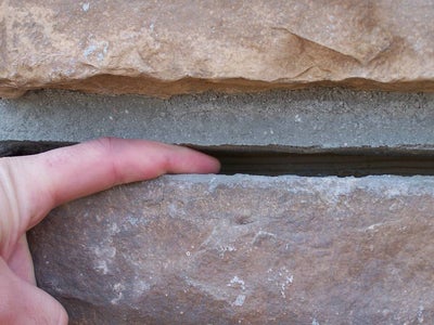 Large horizontal crack between bricks.