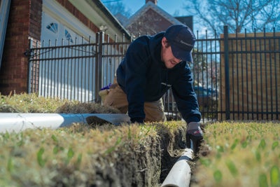 closeup of a discharge line in the ground