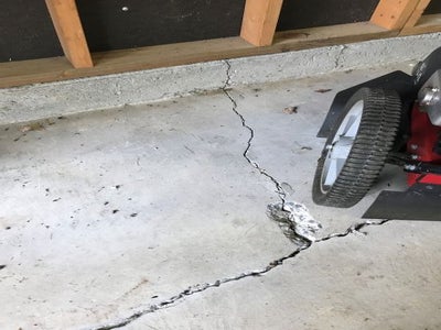 Is Self-Leveling Concrete A Useful Garage Floor Repair? - Alpha Foundations