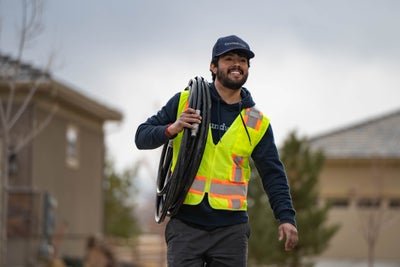 A Groundworks preparing to help out a homeowner.
