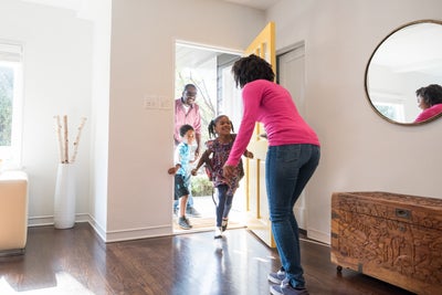 A family excited to be in their brand new home, knowing they are safe from the harmful effects of radon