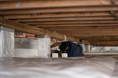 encapsulating and insulating a crawl space