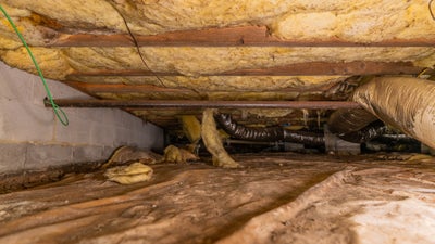 Fiberglass insulation falling down in damp crawl space