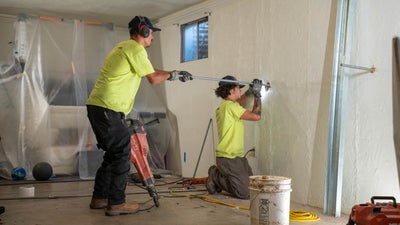 installing wall anchors for foundation wall repair