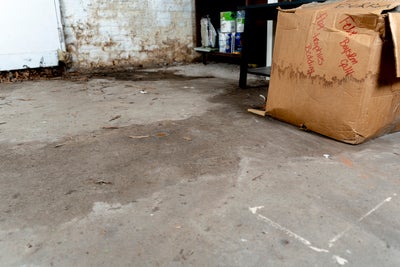 damp box on a wet basement floor