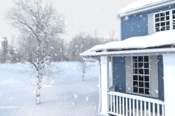 house in snowy winter scene