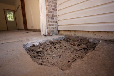 Dirt under a concrete slab.
