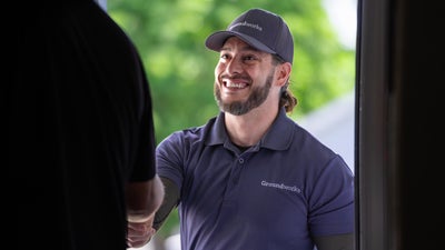 Groundworks inspector shaking a homeowner's hand