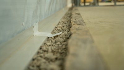 interior basement drainage installation at basement cove joint