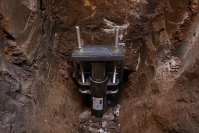 pier bracket running down to bedrock load bearing soil
