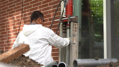 crew installing push piers