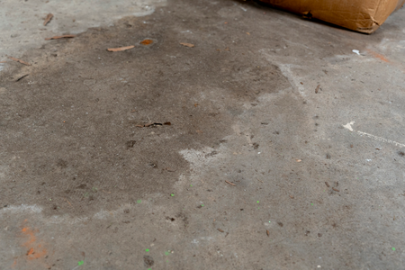 Stagnant water on a basement floor.