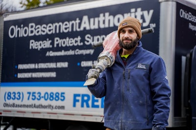 crew member posing smile work truck