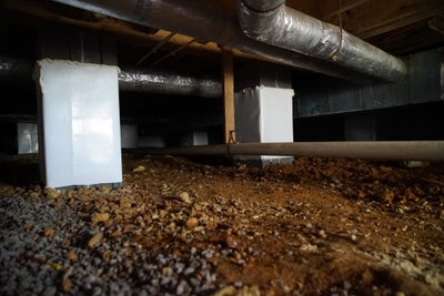 clean crawl space with dirt floor