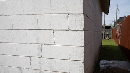 Repaired cracked wall caused by foundation settlement.