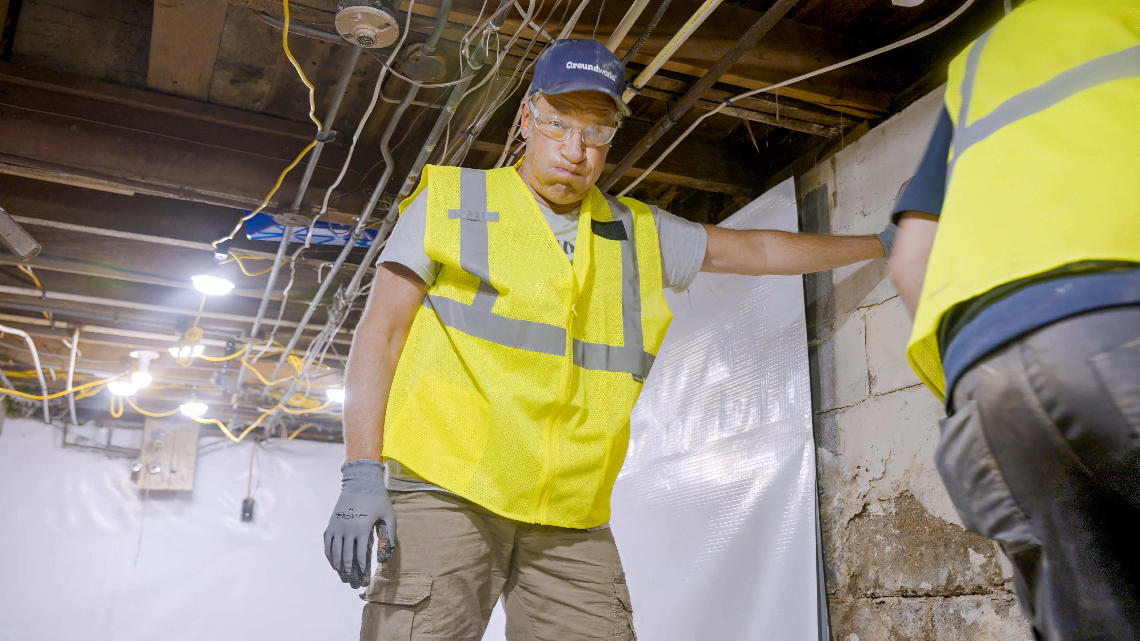 Mike helps the groundworks team clear out a basement