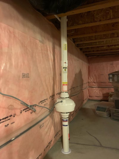 This is a sub-slab depressurization radon mitigation system.